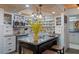 Bright kitchen with stainless steel island and open shelving at 5220 Brittany S Dr # 201, St Petersburg, FL 33715