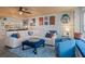 L-shaped sectional sofa in living room, view of kitchen at 5220 Brittany S Dr # 201, St Petersburg, FL 33715