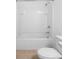 Simple bathroom with shower/tub combo and neutral tile at 5913 Laurelcrest Gln, Palmetto, FL 34221