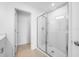 Large bathroom with a walk-in shower and tile floors at 5913 Laurelcrest Gln, Palmetto, FL 34221