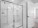 Modern bathroom with a large shower and glass enclosure at 5913 Laurelcrest Gln, Palmetto, FL 34221