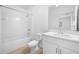 Bathroom with a shower/tub combo and white vanity at 5913 Laurelcrest Gln, Palmetto, FL 34221