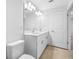Clean bathroom with double vanity and updated white cabinetry at 5913 Laurelcrest Gln, Palmetto, FL 34221
