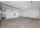 Spacious garage with automatic garage door opener at 5913 Laurelcrest Gln, Palmetto, FL 34221
