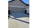 Two-car garage with a large driveway at 5914 Fiore Dr, Bradenton, FL 34208