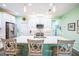 Modern kitchen with white cabinets and quartz counters at 5914 Fiore Dr, Bradenton, FL 34208