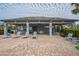 Community pool area with covered seating and lounge chairs at 5914 Fiore Dr, Bradenton, FL 34208