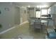Kitchen features a breakfast bar and adjoining dining area with a round table at 6033 34Th W St # 45, Bradenton, FL 34210