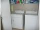 Laundry closet with washer and dryer, and ample storage at 6033 34Th W St # 45, Bradenton, FL 34210