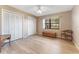 Bedroom with double door closet and wood accents at 6237 Spring Hill Dr, Spring Hill, FL 34606