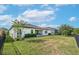 Large backyard with grassy lawn and privacy fence at 6442 Maiden Sea Dr, Apollo Beach, FL 33572