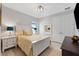 Comfortable bedroom with a queen-size bed and ensuite access at 6442 Maiden Sea Dr, Apollo Beach, FL 33572