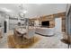 Open concept dining area with seating for six and views to living and kitchen areas at 6442 Maiden Sea Dr, Apollo Beach, FL 33572