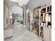 Bright entryway with tiled floors and decorative shelving at 6442 Maiden Sea Dr, Apollo Beach, FL 33572