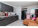 Modern kitchen with dark cabinets and a pink stove at 7028 Oakview Cir, Tampa, FL 33634