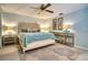 Bright and airy main bedroom, featuring a king-size bed and stylish furnishings at 744 Cadiz Rd # 1, Venice, FL 34285