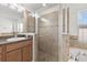 Bright bathroom with walk-in shower and a soaking tub at 8123 Rothbury Hills Pl, Gibsonton, FL 33534