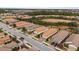 Aerial view of a street with houses in a community at 8424 Alberata Vista Dr, Tampa, FL 33647