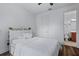 Well-lit bedroom with ensuite bathroom access at 8424 Alberata Vista Dr, Tampa, FL 33647