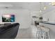 Modern kitchen with stainless steel appliances and breakfast bar at 8424 Alberata Vista Dr, Tampa, FL 33647