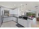 Spacious kitchen featuring granite countertops and stainless steel appliances at 8424 Alberata Vista Dr, Tampa, FL 33647