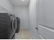Convenient laundry room with washer and dryer at 8424 Alberata Vista Dr, Tampa, FL 33647