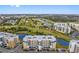 An aerial view shows the condominiums are close to golf course and scenic landscapes at 960 Starkey Rd # 7103, Largo, FL 33771