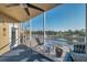 Relaxing screened balcony features a serene view of the lake and golf course at 960 Starkey Rd # 7103, Largo, FL 33771