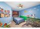 Colorful ' bedroom with farm-themed decorations, a cozy bed, and a playful atmosphere at 960 Starkey Rd # 7103, Largo, FL 33771