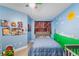 Cute bedroom with blue walls, a bed, and decor at 960 Starkey Rd # 7103, Largo, FL 33771