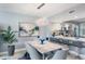 Bright dining area featuring a stylish chandelier and view to kitchen at 960 Starkey Rd # 7103, Largo, FL 33771