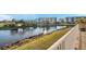 A scenic balcony overlooking a grassy shore and a calm lake at 960 Starkey Rd # 7103, Largo, FL 33771