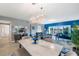 Open concept dining and living space with great natural light and water views at 960 Starkey Rd # 7103, Largo, FL 33771