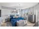 Stylish main bedroom featuring a modern chandelier, gray dresser and bright windows at 960 Starkey Rd # 7103, Largo, FL 33771