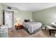 Bedroom with double bed, dresser and carpet flooring at 9940 47Th N Ave # 120, St Petersburg, FL 33708