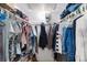 Spacious walk-in closet with ample hanging space and shelving at 9940 47Th N Ave # 120, St Petersburg, FL 33708