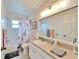 Spa-like bathroom with a shower, toilet, and vanity at 10735 Deepbrook Dr, Riverview, FL 33569