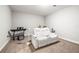 Cozy carpeted room with a white leather electric reclining sofa at 10920 Flint Estates Dr, Thonotosassa, FL 33592