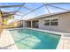 Inviting screened-in pool in backyard with a deck at 10920 Flint Estates Dr, Thonotosassa, FL 33592