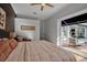 Main bedroom with king bed and sliding doors leading to a private patio at 1108 92Nd Nw St, Bradenton, FL 34209