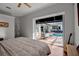 Main bedroom with sliding glass doors opening to a private pool at 1108 92Nd Nw St, Bradenton, FL 34209