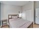 Bedroom with double bed, nightstand, and ample closet space at 11225 Scotchwood Dr, Riverview, FL 33579