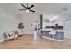 Open concept kitchen with island, seating, and modern finishes at 11225 Scotchwood Dr, Riverview, FL 33579