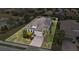 Aerial view of a single-Gathering home with a landscaped yard at 11465 Bitola Dr, Odessa, FL 33556