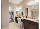 Bathroom boasts double vanity and a large walk-in shower at 11465 Bitola Dr, Odessa, FL 33556