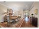 Elegant dining room with chandelier and hardwood floors at 11465 Bitola Dr, Odessa, FL 33556