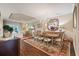Elegant dining room with chandelier and hardwood floors at 11465 Bitola Dr, Odessa, FL 33556