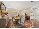 Elegant dining room with chandelier and hardwood floors at 11465 Bitola Dr, Odessa, FL 33556