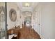 Bright and spacious entryway with hardwood floors and elegant decor at 11465 Bitola Dr, Odessa, FL 33556
