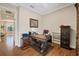 Home office features built-in shelving and wood desk at 11465 Bitola Dr, Odessa, FL 33556